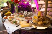 a table full of food on top of a table at Vivere Ad Parcum - Bed And Breakfast in Krefeld