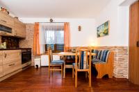 Kuchyň nebo kuchyňský kout v ubytování Apartmány Domino