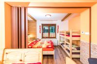 Postel nebo postele na pokoji v ubytování Apartmány Domino