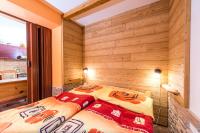 Postel nebo postele na pokoji v ubytování Apartmány Domino