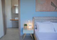 Posteľ alebo postele v izbe v ubytovaní Afrala Summerhouse