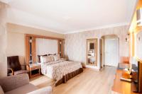 Postel nebo postele na pokoji v ubytování LAUR HOTELS Experience & Elegance