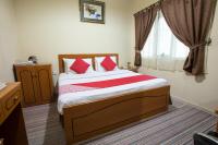 Postel nebo postele na pokoji v ubytování Al Jazeerah Hotel