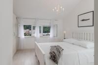 Posteľ alebo postele v izbe v ubytovaní Cozy Dubrovnik Apartment