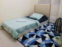 A1-04-03 Damiana Apartmentにあるベッド