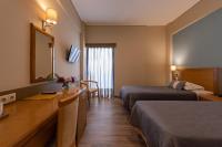 Postel nebo postele na pokoji v ubytování Hotel Ostria