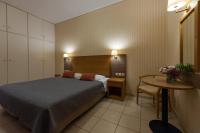 Postel nebo postele na pokoji v ubytování Hotel Ostria
