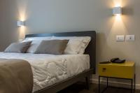 Posteľ alebo postele v izbe v ubytovaní Plebis - B&B in Sicilia nel centro storico di Catania