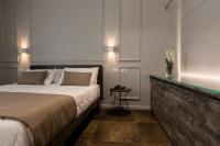 Posteľ alebo postele v izbe v ubytovaní Plebis - B&B in Sicilia nel centro storico di Catania