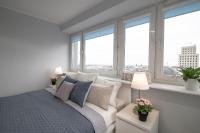 Posteľ alebo postele v izbe v ubytovaní WLR Apartments - Świętokrzyska I