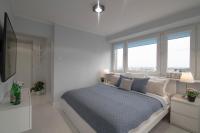Posteľ alebo postele v izbe v ubytovaní WLR Apartments - Świętokrzyska I