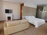 Postel nebo postele na pokoji v ubytování Hospedium Hotel Cañitas Maite Boutique