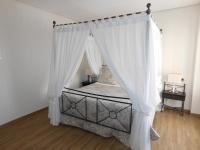 Postel nebo postele na pokoji v ubytování Hospedium Hotel Cañitas Maite Boutique