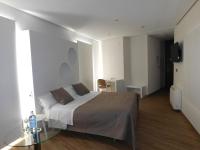 Postel nebo postele na pokoji v ubytování Hospedium Hotel Cañitas Maite Boutique