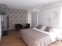 Postel nebo postele na pokoji v ubytování Hospedium Hotel Cañitas Maite Boutique