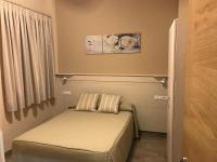 Postel nebo postele na pokoji v ubytování Hostal Los Encinares