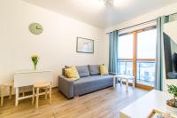 Televízia a/alebo spoločenská miestnosť v ubytovaní Apartament Master