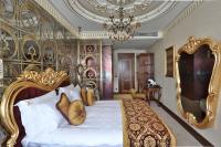 Postel nebo postele na pokoji v ubytování Daru Sultan Hotels Galata