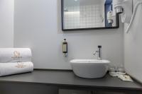 Uma casa de banho em Sport Hotel Gym + SPA