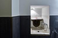 a bathroom with a toilet and a sink at Palazzetto Rosso - Art Hotel in Siena