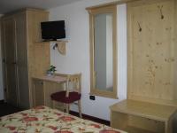 Posteľ alebo postele v izbe v ubytovaní Hotel Negritella