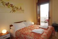 Posteľ alebo postele v izbe v ubytovaní B&B Piazza 300mila