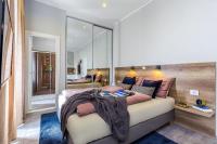 Posteľ alebo postele v izbe v ubytovaní Number 1 Deluxe Apartments