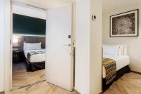 Eurostars Puerta Realにあるベッド