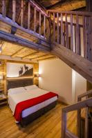 Posteľ alebo postele v izbe v ubytovaní Hotel Pilier D'Angle & Wellness