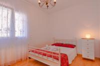 A bed or beds in a room at Villas Guzman-Grinev