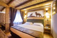 Posteľ alebo postele v izbe v ubytovaní Hotel Pilier D'Angle & Wellness