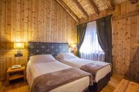 Posteľ alebo postele v izbe v ubytovaní Hotel Pilier D'Angle & Wellness