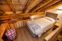 Posteľ alebo postele v izbe v ubytovaní Hotel Pilier D'Angle & Wellness