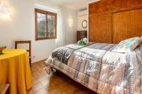 A bed or beds in a room at Villa Granoters By homevillas360