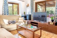 A television and/or entertainment centre at Villa Granoters By homevillas360