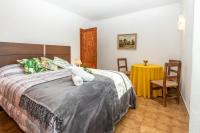 A bed or beds in a room at Villa Granoters By homevillas360