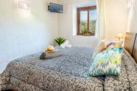 A bed or beds in a room at Villa Granoters By homevillas360