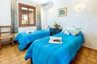 A bed or beds in a room at Villa Granoters By homevillas360