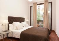Postel nebo postele na pokoji v ubytování EasySleep Gaudi Terrace