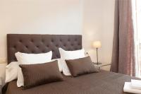 Postel nebo postele na pokoji v ubytování EasySleep Gaudi Terrace
