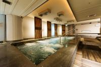 a swimming pool in the middle of a room at Beitou Hot Spring Resort in Taipei