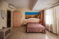 Posteľ alebo postele v izbe v ubytovaní Hotel Sileoni