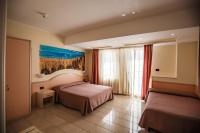 Posteľ alebo postele v izbe v ubytovaní Hotel Sileoni