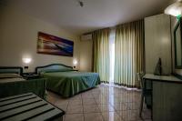 Posteľ alebo postele v izbe v ubytovaní Hotel Sileoni