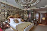 Postel nebo postele na pokoji v ubytování Daru Sultan Hotels Galata