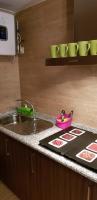 A kitchen or kitchenette at Apartamentos Turísticos Toledo