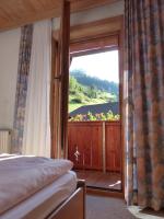 Łóżko lub łóżka w pokoju w obiekcie Hotel Gasthof Islitzer