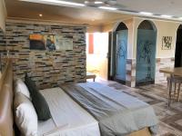Postel nebo postele na pokoji v ubytování Sosua Inn Hotel