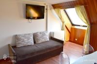 Televízia a/alebo spoločenská miestnosť v ubytovaní Hotel Alda Santa Cristina