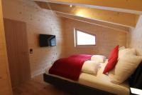 Televízia a/alebo spoločenská miestnosť v ubytovaní Heidi Chalets Falkert Heidialm - Chalet Almsommer